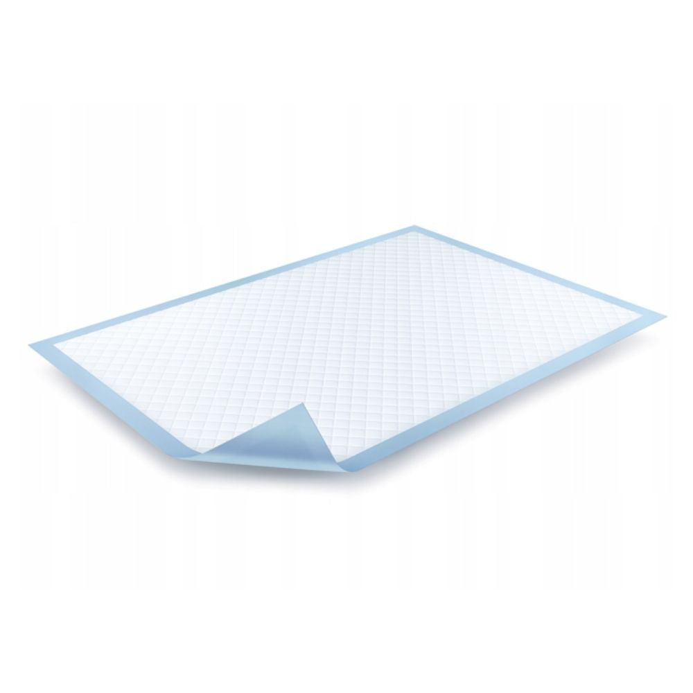 The BeeSana® ComCell pad by Meditrade GmbH is a rectangular disposable pad in the format 60 x 90 cm with a white quilted top and a distinctive blue border. One corner can be lifted to reveal the light blue underside, highlighting its property as a superabsorbent hygienic pad. Pack of 25 pieces.